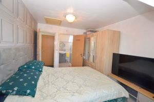 Bedroom One- click for photo gallery